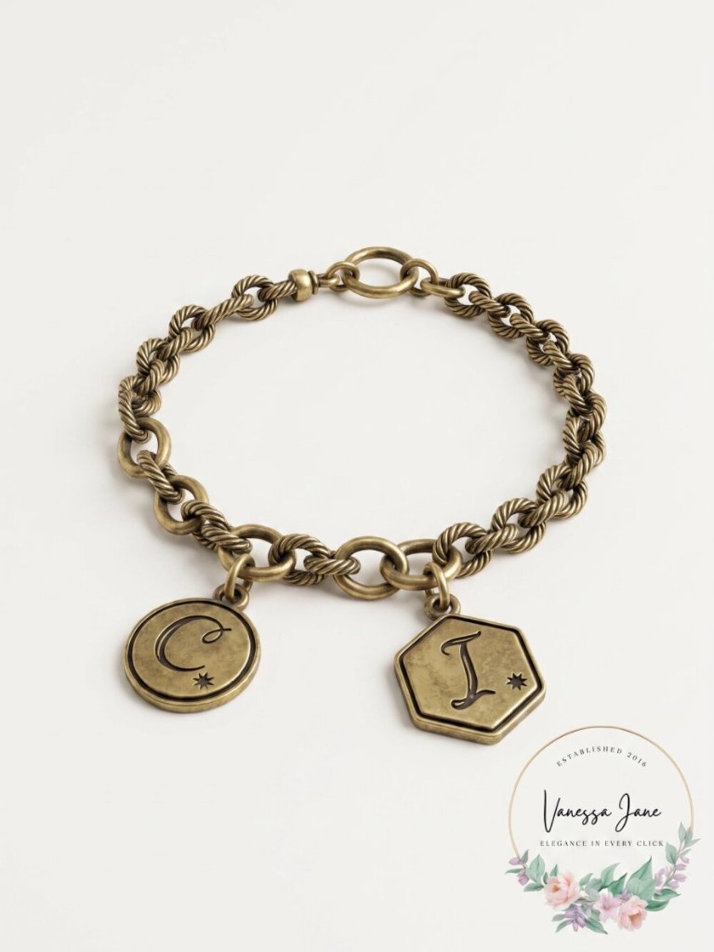 CHLOE + ISABEL Tresors Heirloom antiqued brass plated charm bracelet with C and